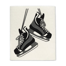 画像をギャラリービューアに読み込む, a kitchen dishcloth with black and white hockey skates featured 
