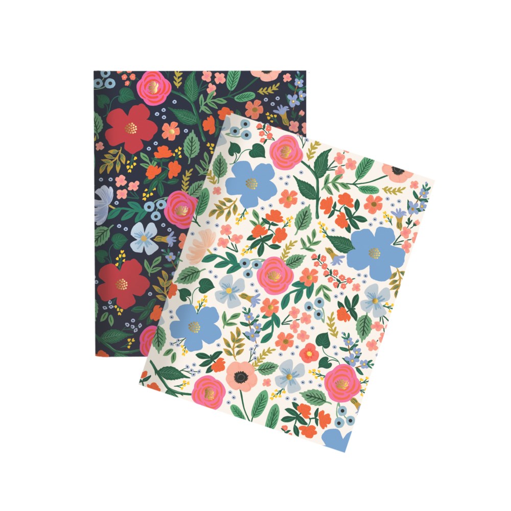 a pair of notebooks with flowers on each . blue, red, pink, green