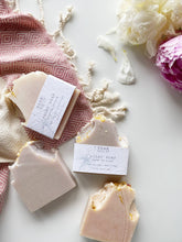 Load image into Gallery viewer, a peony soap bar and a lilac soap bar 
