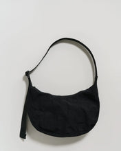 Load image into Gallery viewer, a baggu crescent bag in black colour 
