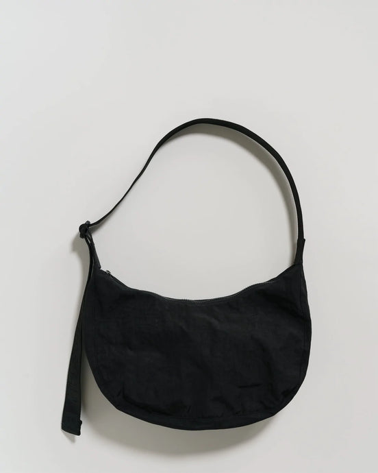 a baggu crescent bag in black colour 
