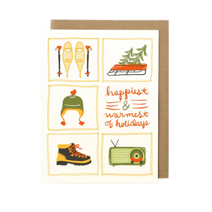 greeting card woth snow shoes, sled, boots, radio and touque, winter hat with text happiest & warmest of holidays 