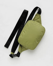 Load image into Gallery viewer, a puffy baggu fanny pack in pistachio colour with black strap 
