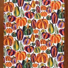 Load image into Gallery viewer, a tea towel with colourful pictures of pumpkins 
