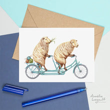 Load image into Gallery viewer, a greeting card with 2 sheep riding a bicycle built for 2
