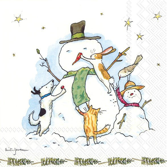 a paper napkin with picture of snowman being decorated by a dog cat rabbit and bird. very cute 