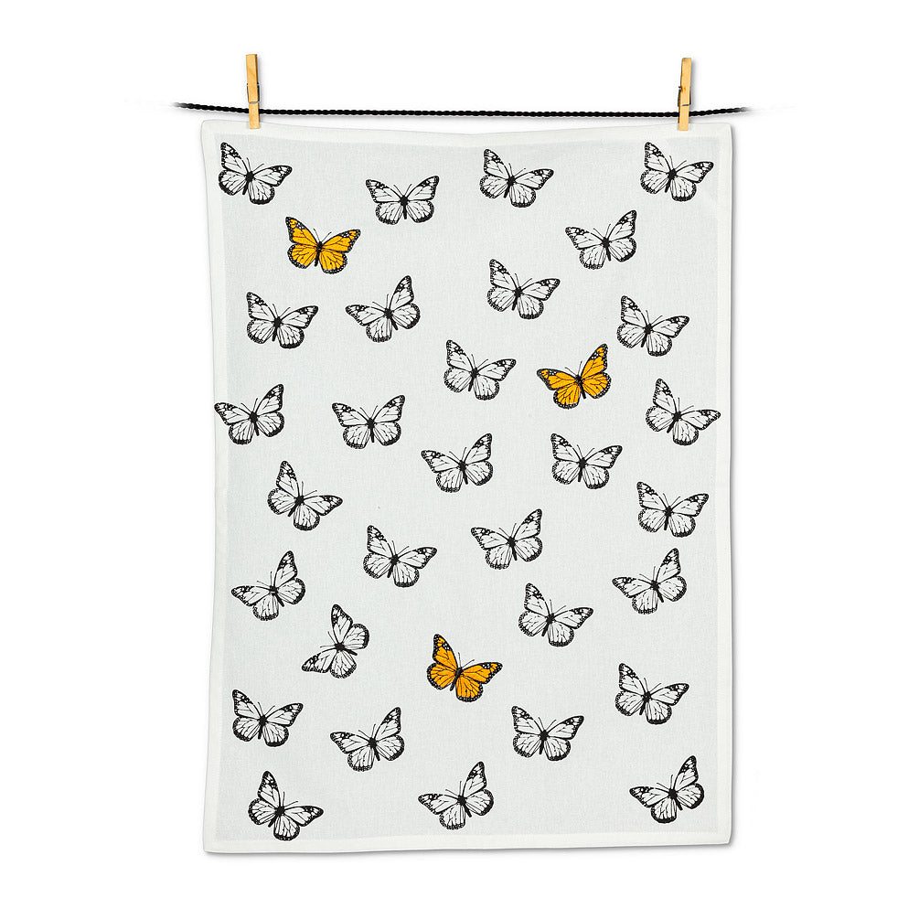 a white tea towel with black and white butterflies and three colour monarch butterflies motif 