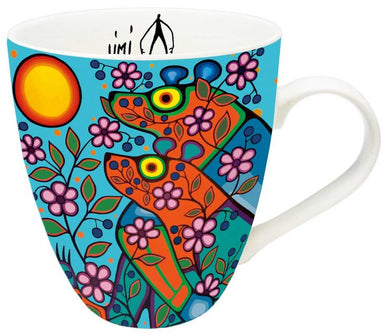 a mug of Indigenous design with 3 bears and pink flowers 