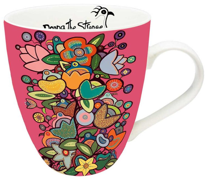 a mug of Indigenous design with flowers 