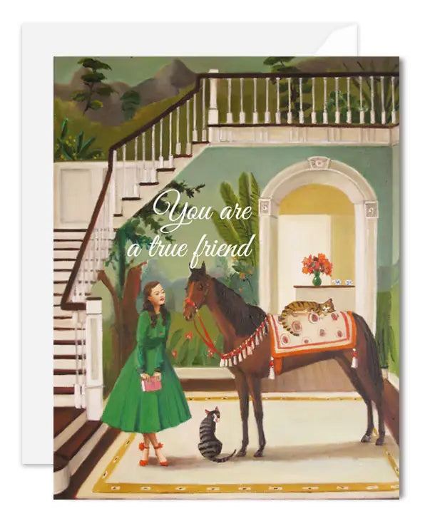 a greeting card with a colour illustration of a womanstanding beside a horse with a cat on its back and a cat on the floor they are inside a house in the front hall with a grand staircase. text you are a true friend
