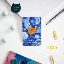 Load image into Gallery viewer, A broach or lapel pin with the likeness of vincent van gogh as a cat, with one ear missing on a starry night small card 
