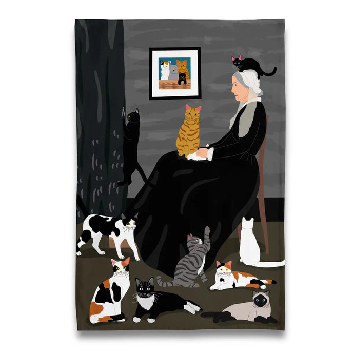 a kitchen tea towel deoicting the painting whistlers mother with ats all over the place including on top of her head 